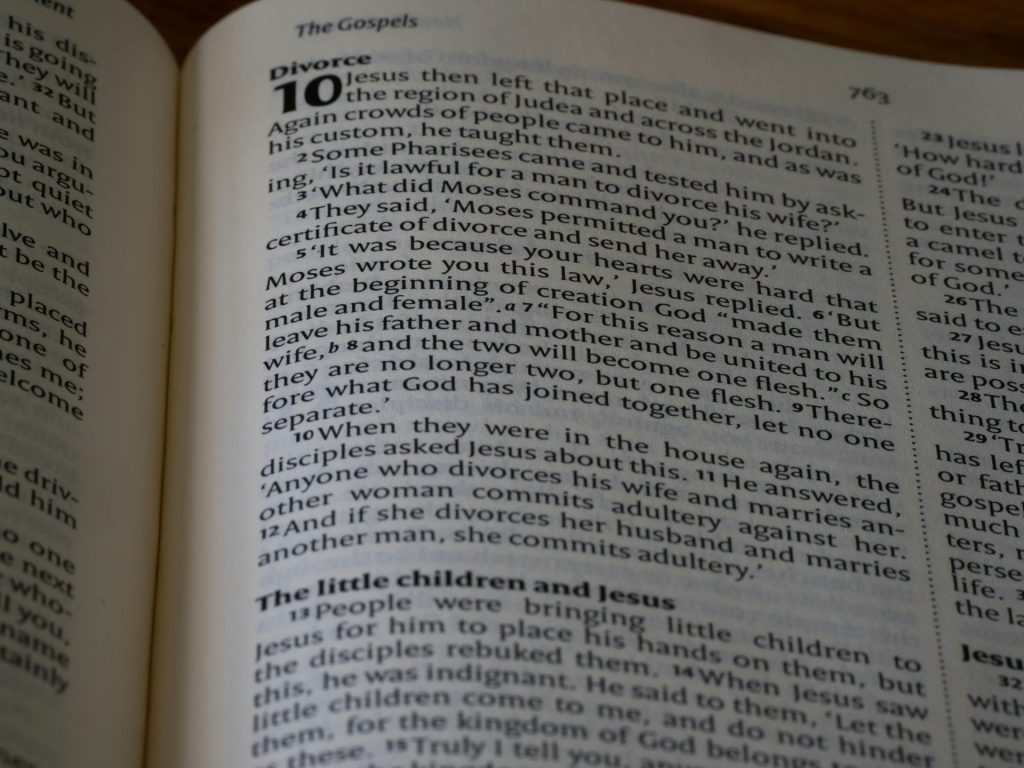 a close up of an open book on a table
