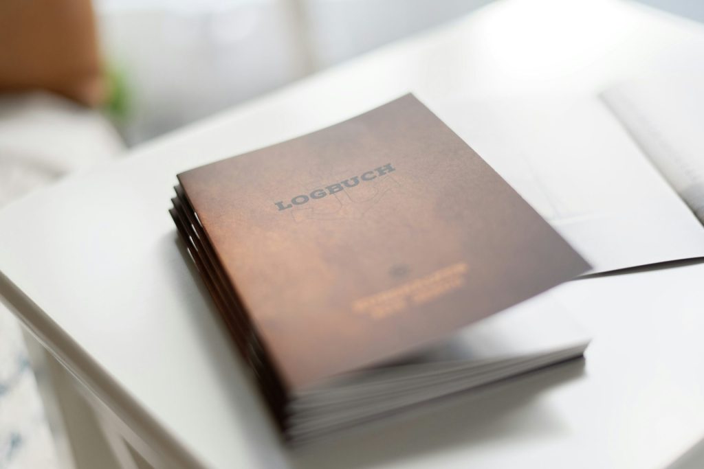 Logbuch notebook on table